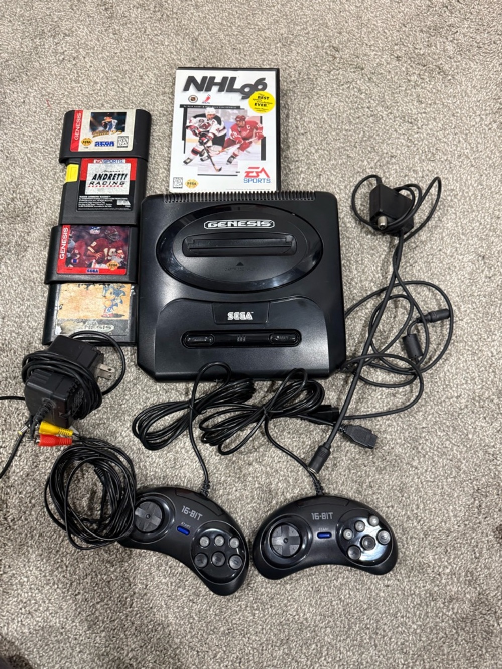 Sega genesis with 2 new aftermarket controllers and 5 games